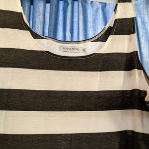 Miss Look Brand . Size 3X runs small Black and white Sleeveless summer dress .